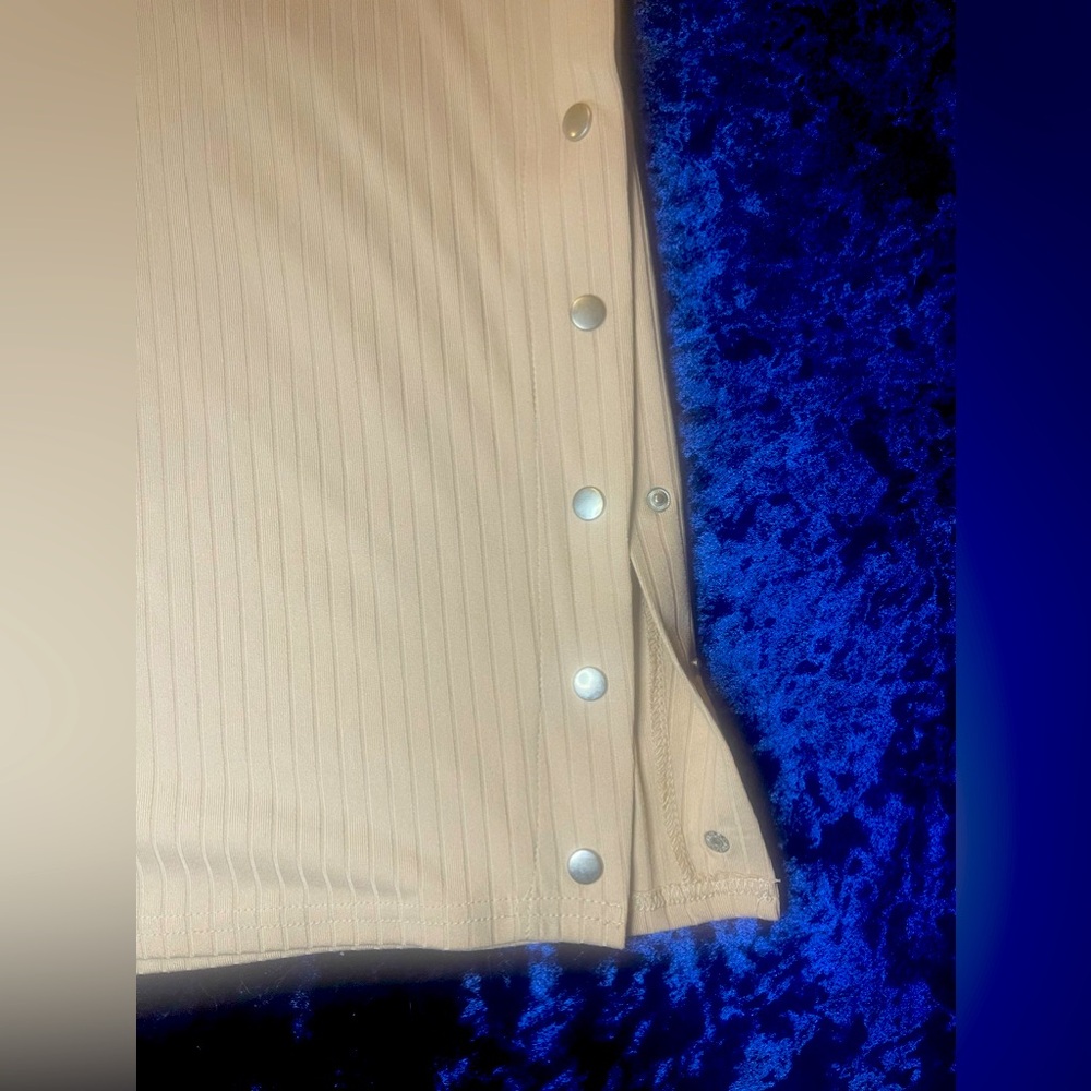 Beige tube dress with buttons near thigh area. Very sexy and comfy. NWT